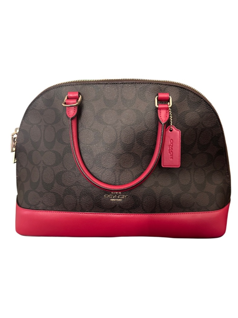 Coach Brown Signature Dome Satchel with Pink Trim.